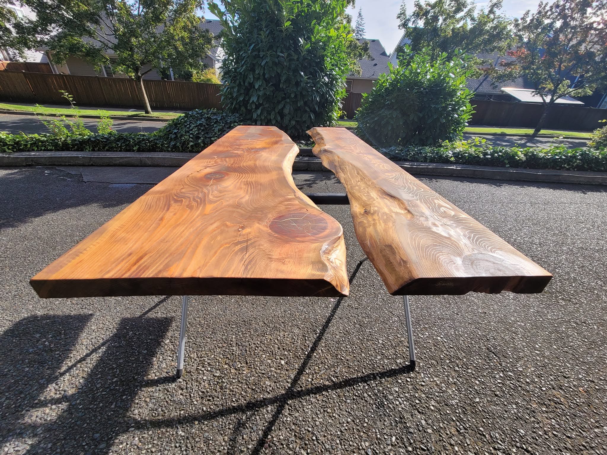 Custom live-edge wood slab tables on hairpin legs — outdoor furniture craftsmanship